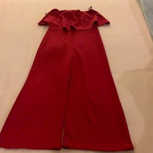 Red off shoulder jumpsuit with flare legs